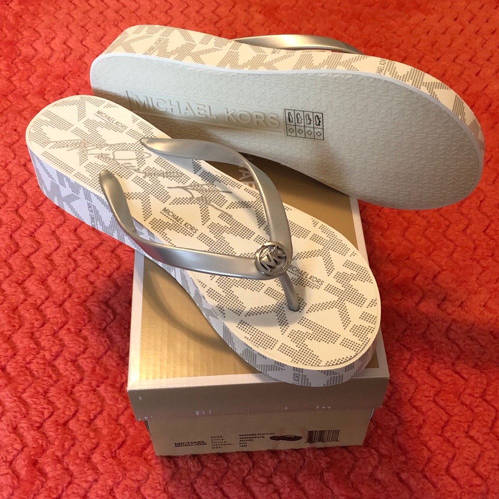 Michael kors White and silver wedge flip flops 10